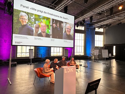 Nadja on stage during a panel discussion